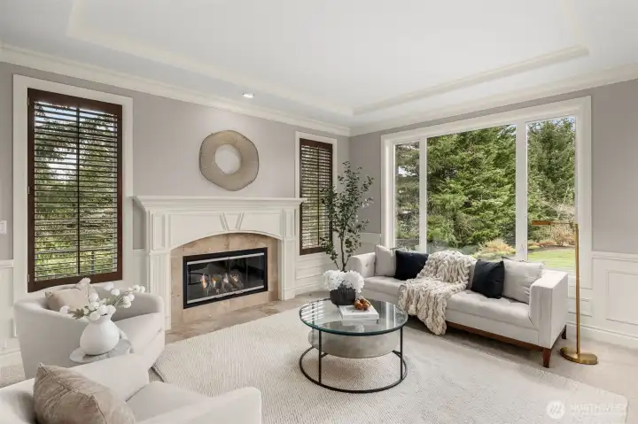 formal living with cozy fireplace