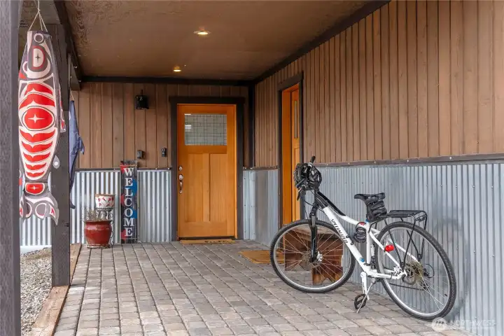 The large covered entry offers great weather protection and easy garage access.