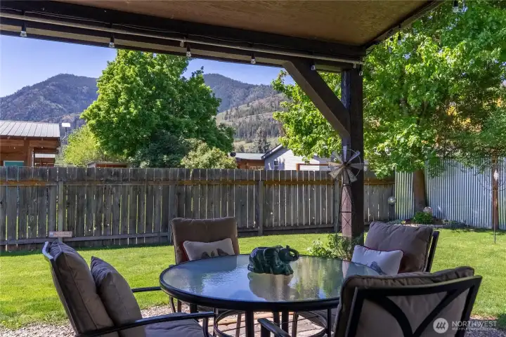 The large yard is fully fenced offering a quiet oasis right in the heart of town.