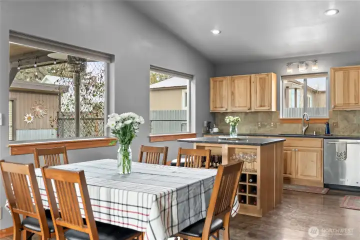The dining area connects the living room with the kitchen.