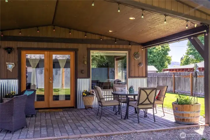 The covered porch was designed for 3-season outdoor living and is a key feature of this lovely home.