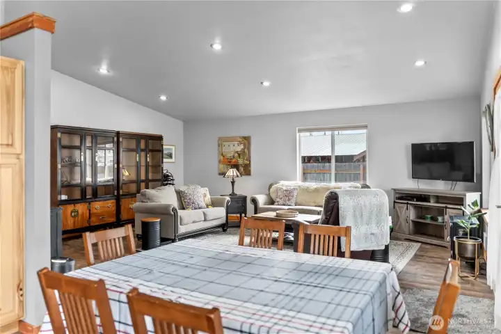 The living area has high ceilings and well-placed windows for balanced natural light.