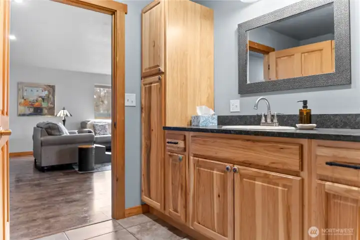 The full second bath is roomy and has lots of storage.