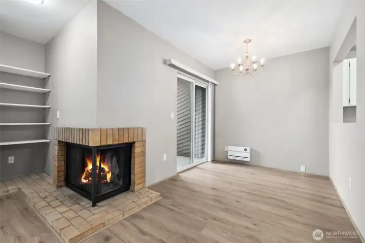 The dining space is tucked nicely in between the kitchen and the expansive private balcony.