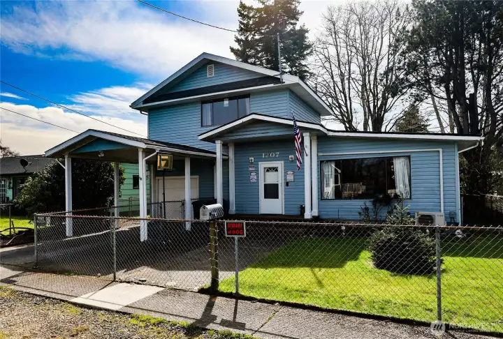 Garage, carport and fully fenced yard