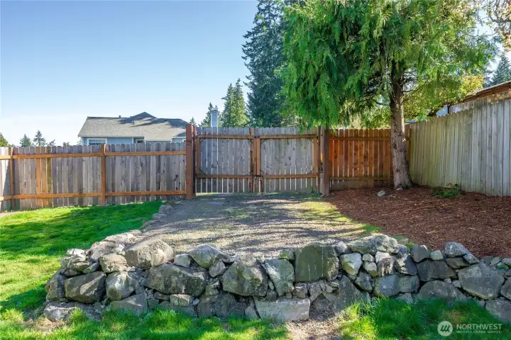 Convenient gated extra parking spot in back yard