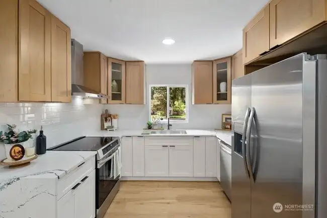 Sunlight floods the kitchen.