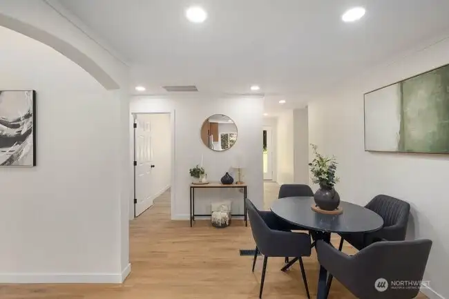Looking from the walk in pantry door towards the eating area and beyond.