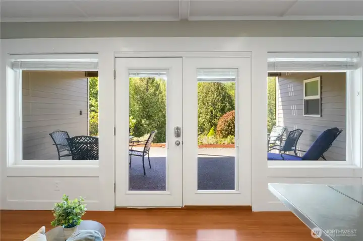 Another set of French doors takes you out to the covered lower patio.