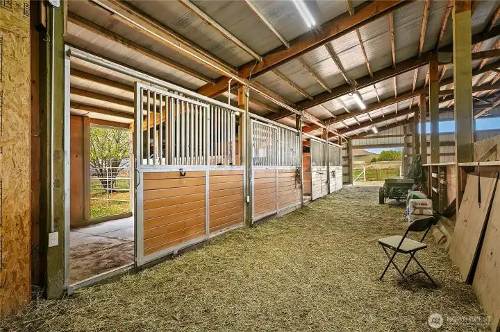 Functional barn layout supports both everyday horse care and larger-scale equestrian use. Functional barn layout supports both everyday horse care and larger-scale equestrian use.