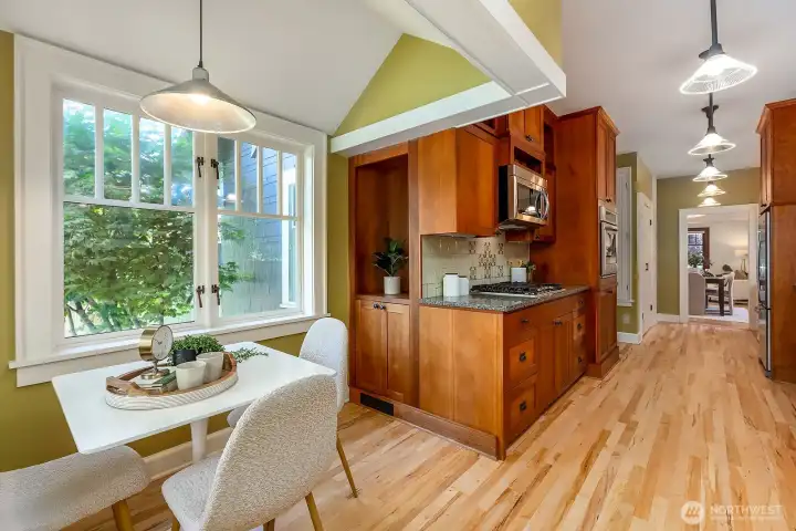 Gas range, generous counter and cabinet storage. House bump-out and major remodel.