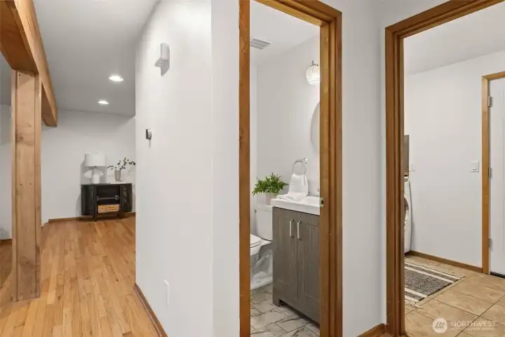 Thoughtfully designed floor plan includes a powder room and dedicated laundry space on the main level. Thoughtfully designed floor plan includes a powder room and dedicated laundry space on the main level.