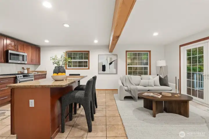 Family room and kitchen are thoughtfully connected, offering flexibility for daily living and entertaining. Family room and kitchen are thoughtfully connected, offering flexibility for daily living and entertaining.