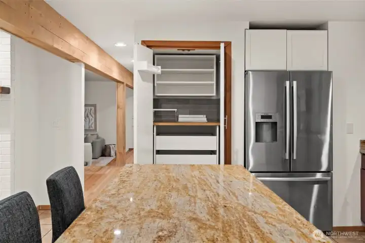 Kitchen pantry features built-in organization, countertop workspace, and generous storage capacity. Kitchen pantry features built-in organization, countertop workspace, and generous storage capacity.