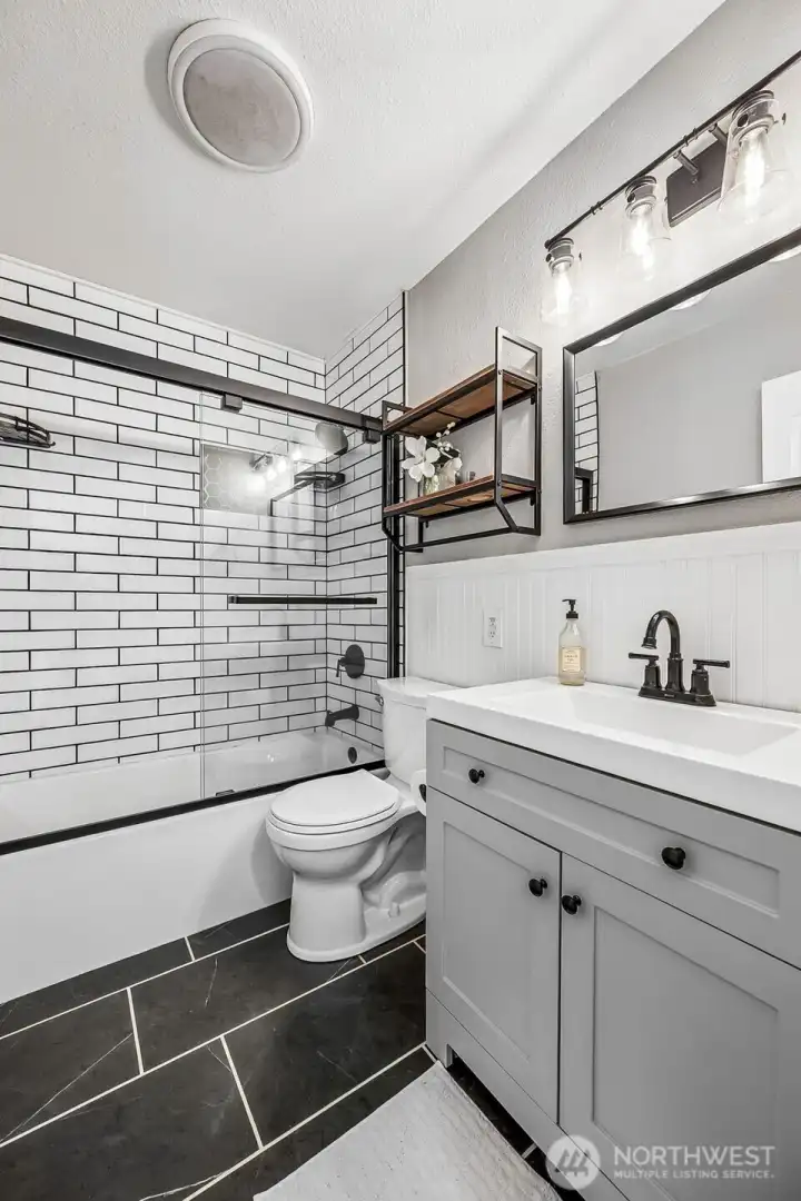 Main level full bathroom that has been beautifully updated