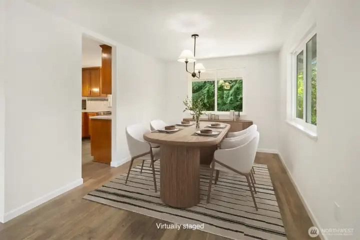 Formal dining room opens to kitchen