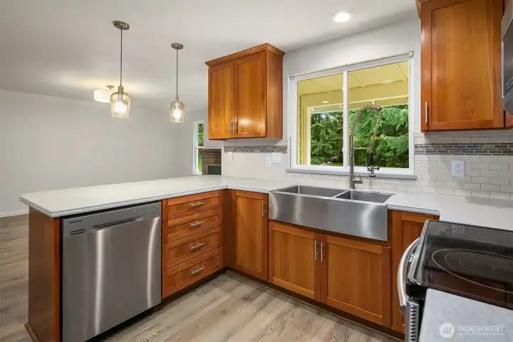 Stainless steel appliances & cherry cabinets