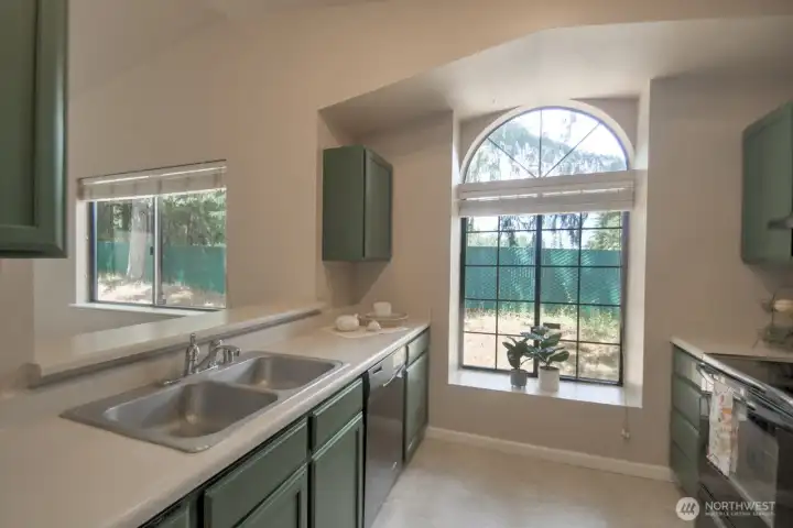 Kitchen overlooks the living spaces...