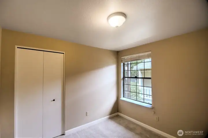 First of two additional bedrooms...