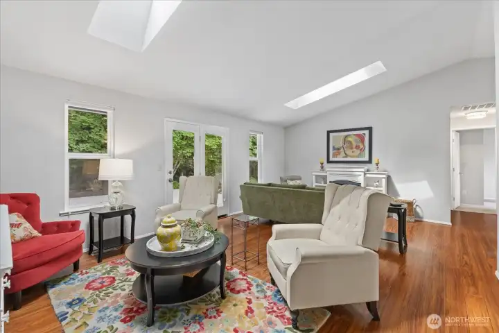 The large living room is split into two sitting areas. The large living room is split into two sitting areas.