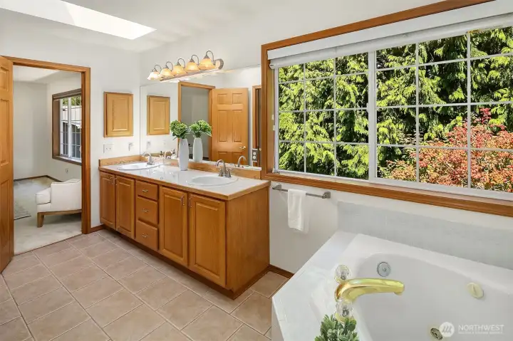 Across from the vanity is the entry to the large primary closet.