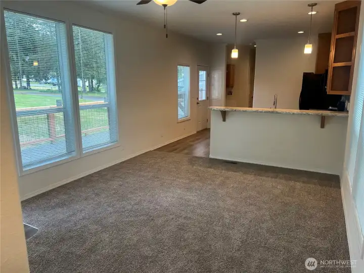 Open and bright living room with large windows. Open and bright living room with large windows.