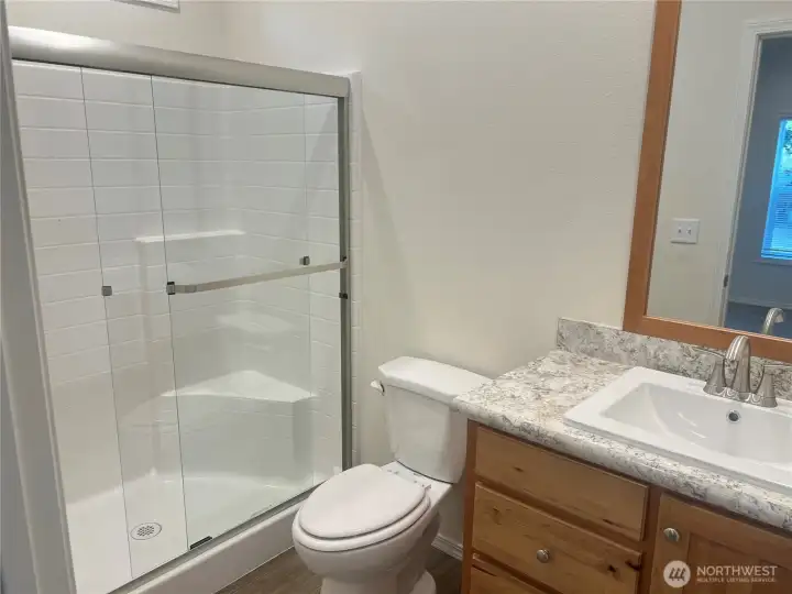 Primary bathroom with walk in shower. Primary bathroom with walk in shower.
