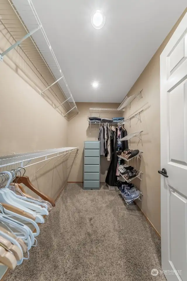 Primary bedroom with dual walk in closets 2/2