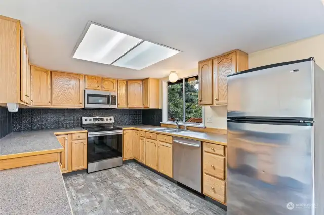 Large kitchen with ample cupboard and counter space