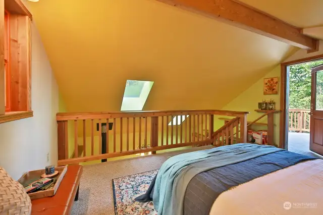 Looking back towards the ceiling of the main living area, door to the right leads to your deck. Skylights!!!