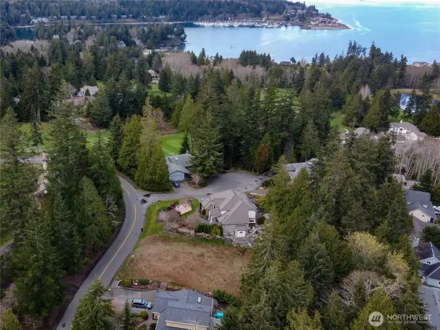 Lot 40 is close to Port Ludlow Bay, the marina, Inn, trails, and the second hole of the first 9 is in the photo.
