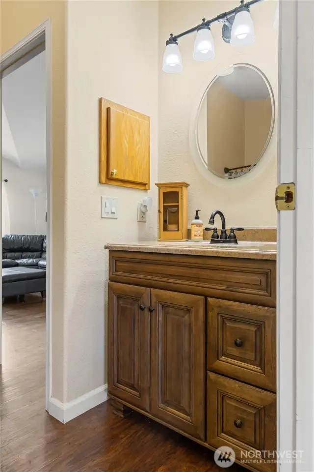 Full bath off living and utility room