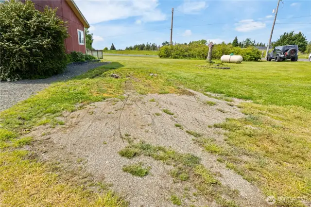Side yard off gravel parking