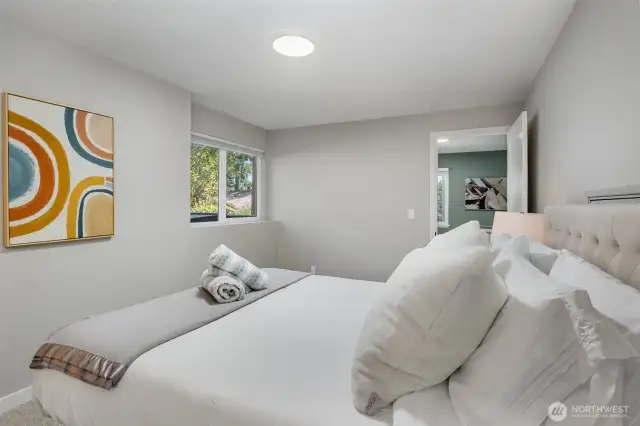 (Approx 11x15') 2nd bedroom downstairs with walk-in closet & black-out blinds