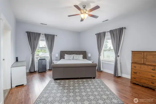 The second floor starts with a primary bedroom that will amaze.