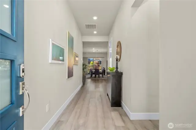 Generous entryway. Stunning Engineered hardwoods and upgraded trim package.