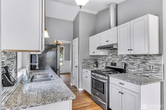 Lots of cabinets and kitchen includes a pantry