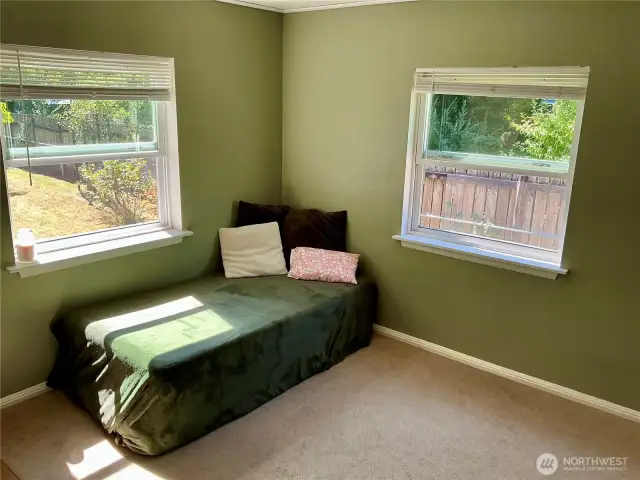 bedroom 2 has double window and a corner facing back yard
