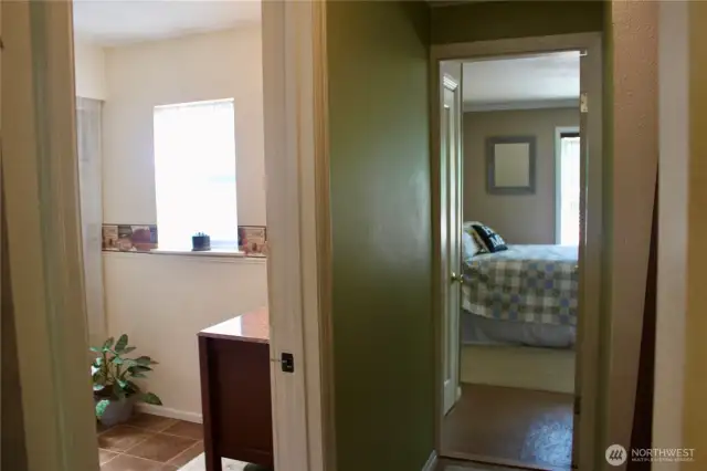 Hall View Bathroom & Primary Bedroom
