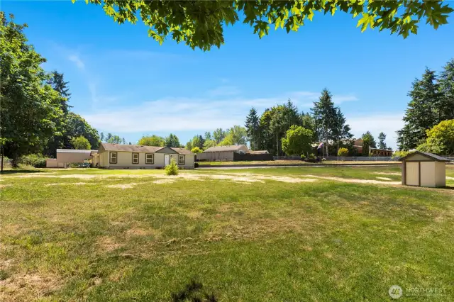 Spacious yard on nearly an acre