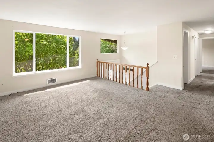 Living room looking toward entry stairs
