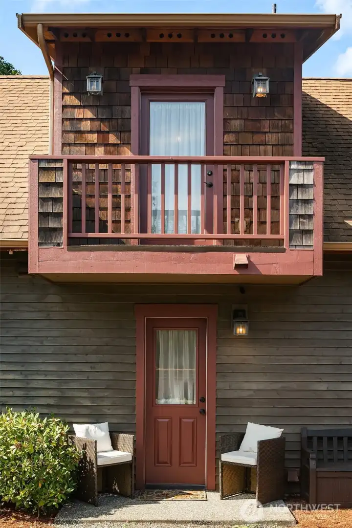 Side door entry to laundry area. Private Balcony above.