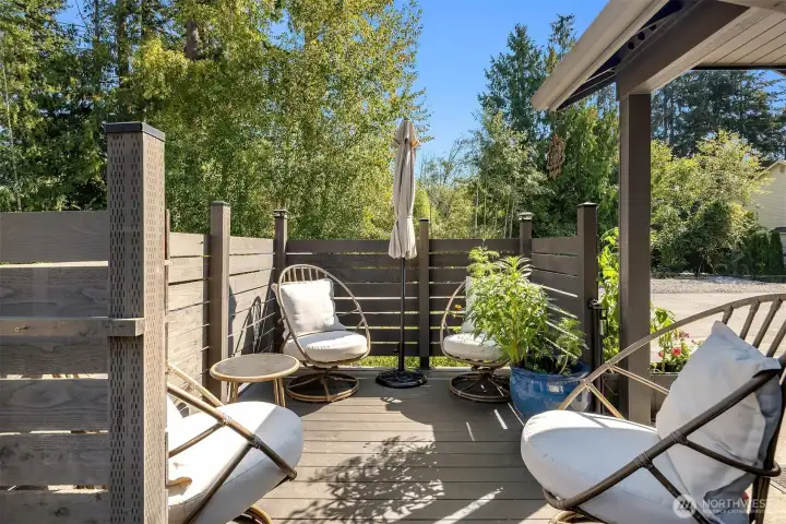 Patio seating easily fits four oversized chairs, perfect for hanging out on a summer day!