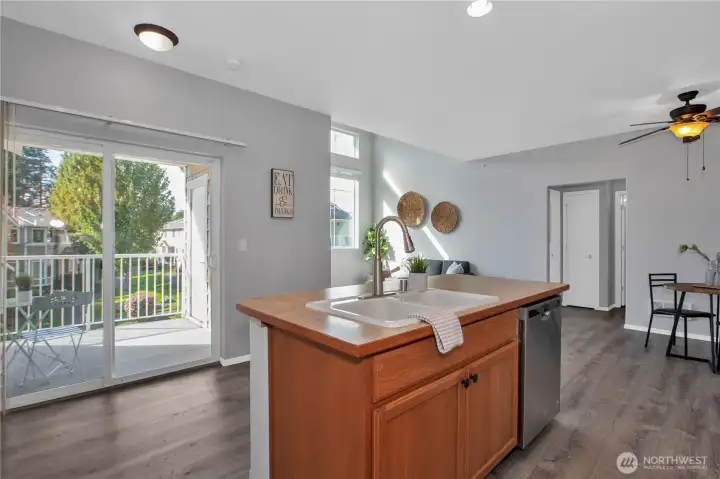 Kitchen looks out over the covered patio
