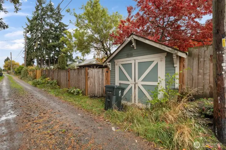 Back Alley with access to private garage and lockable fence gate