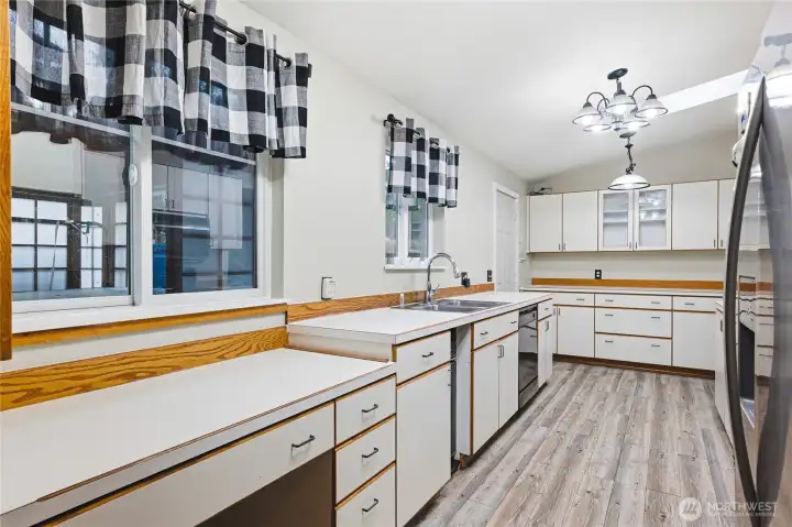 Beautiful bright kitchen with plenty of cabinet space.