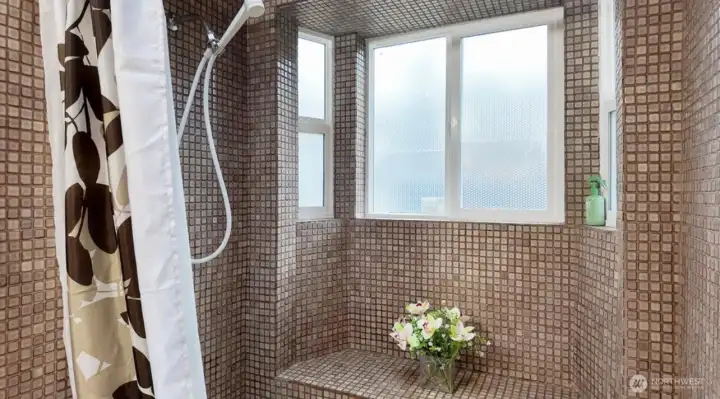 Beautiful Tile encased spa inspired shower and tub!