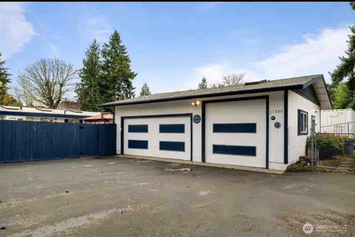Large two car garage with half bath a shop/office!