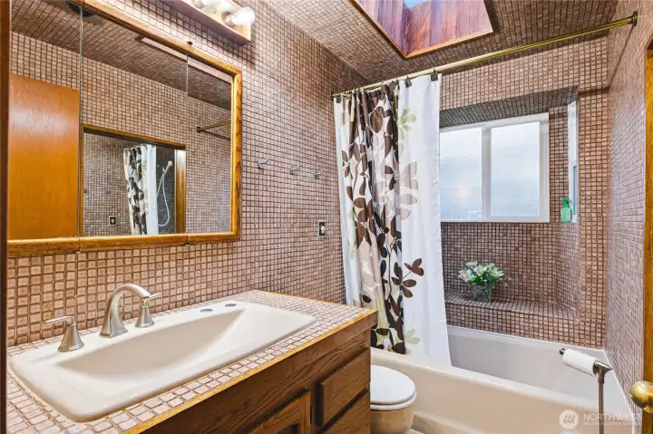 Beautiful Tile encased spa inspired shower and tub!