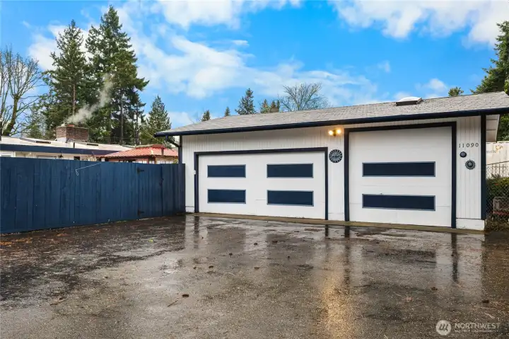 Large detached garage with half bath a shop/office!